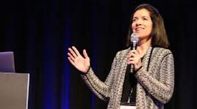 Co-PI Cecelia Aragorn presents on stage
