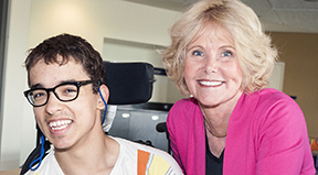 Sheryl smiles with a student from the DO-IT Scholars program